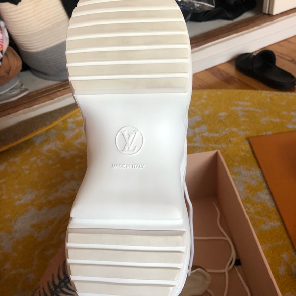 Metallic Gold Louis Vuitton arch light sneakers. - Picture 4 of 7